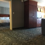 Hotel living area and dresser Courtyard Marriott